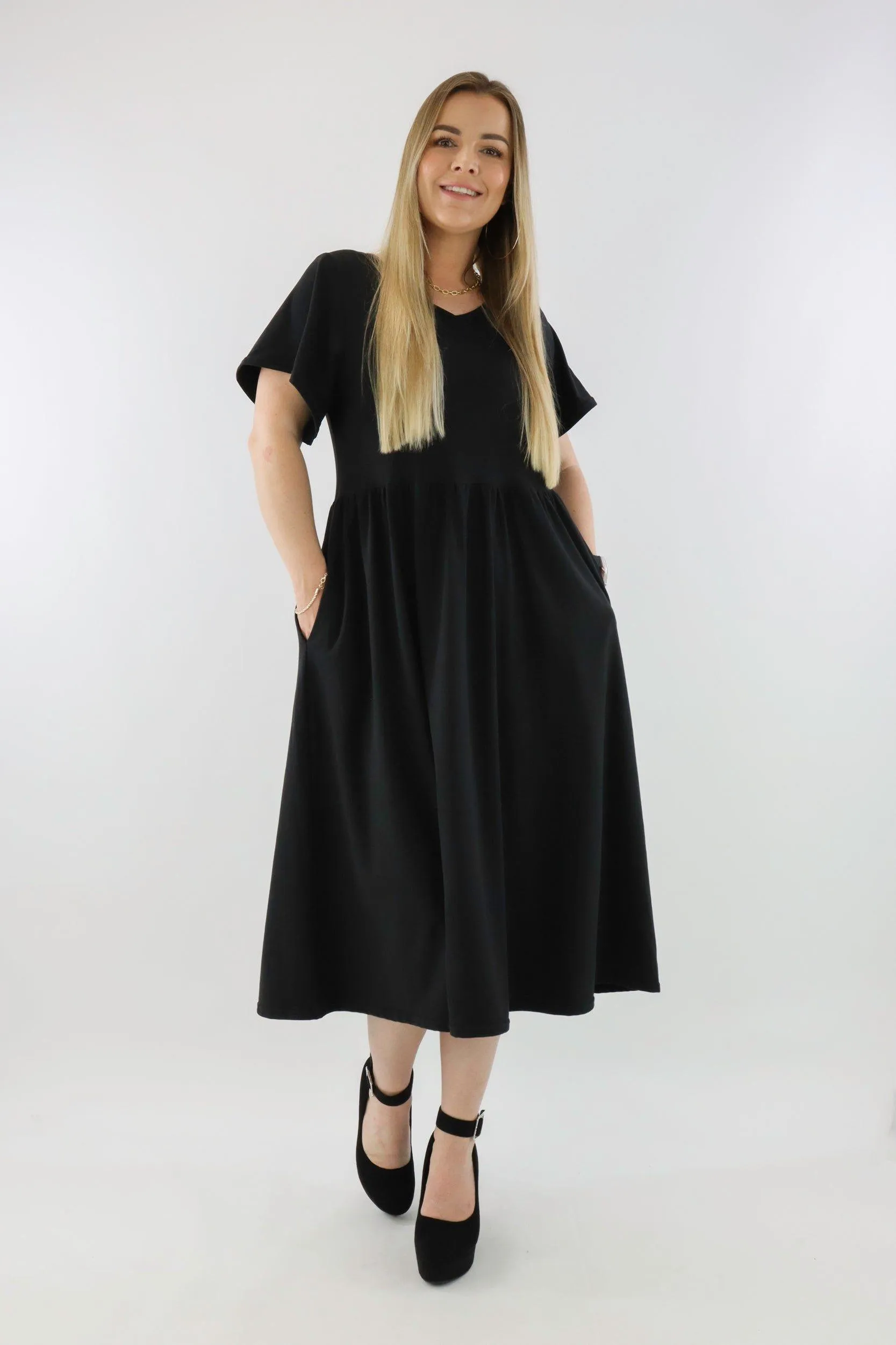 Black - V-neck - Flutter Sleeve A-Line Dress - Midi Length - Side Pockets