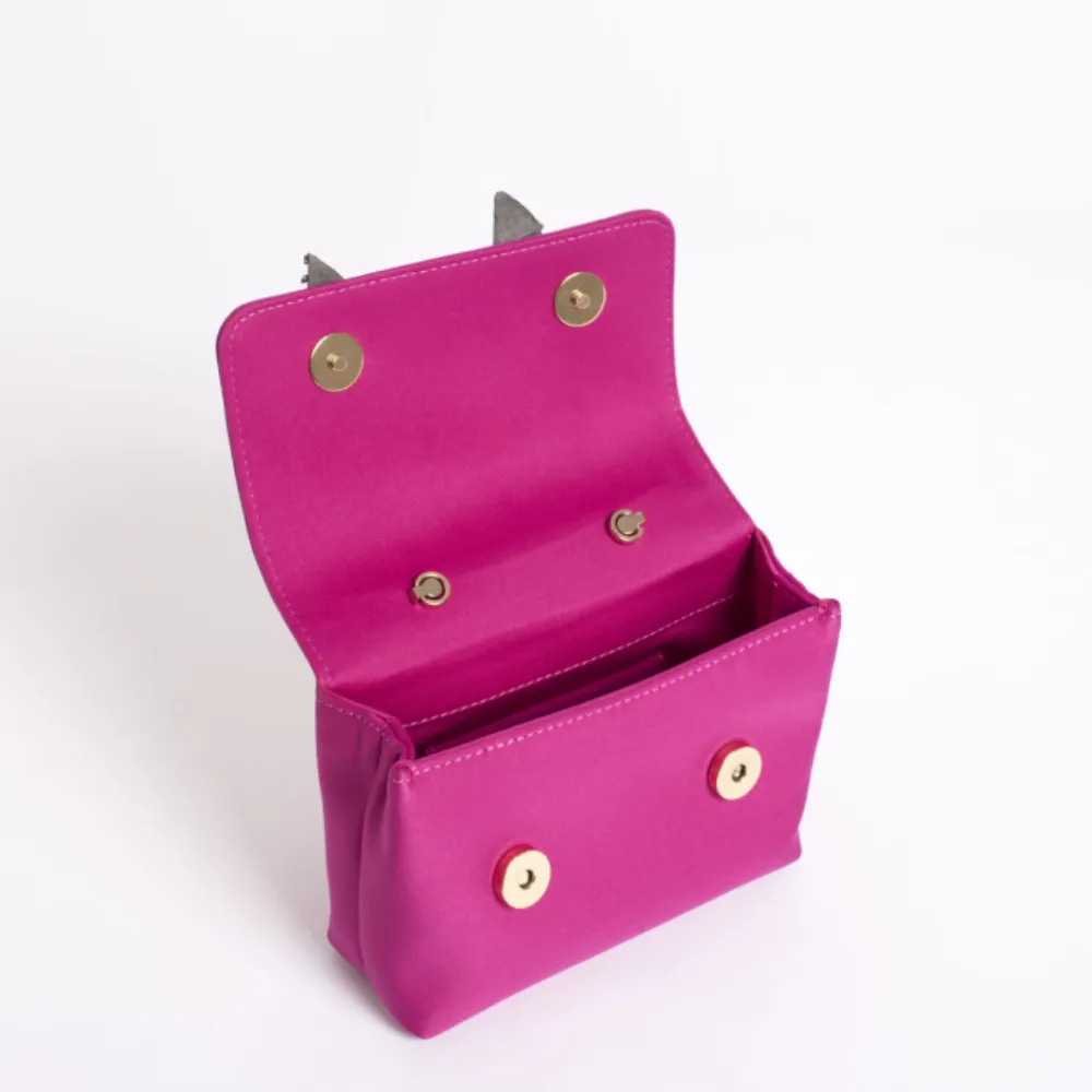 Bow Embelisshed Sling cum Clutch