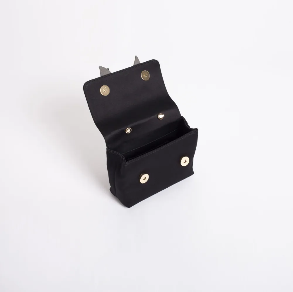 Bow Embelisshed Sling cum Clutch