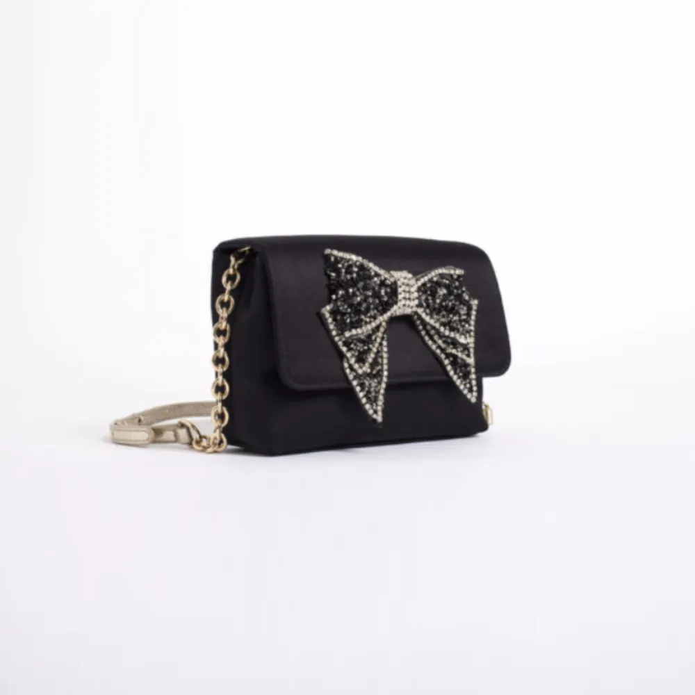 Bow Embelisshed Sling cum Clutch