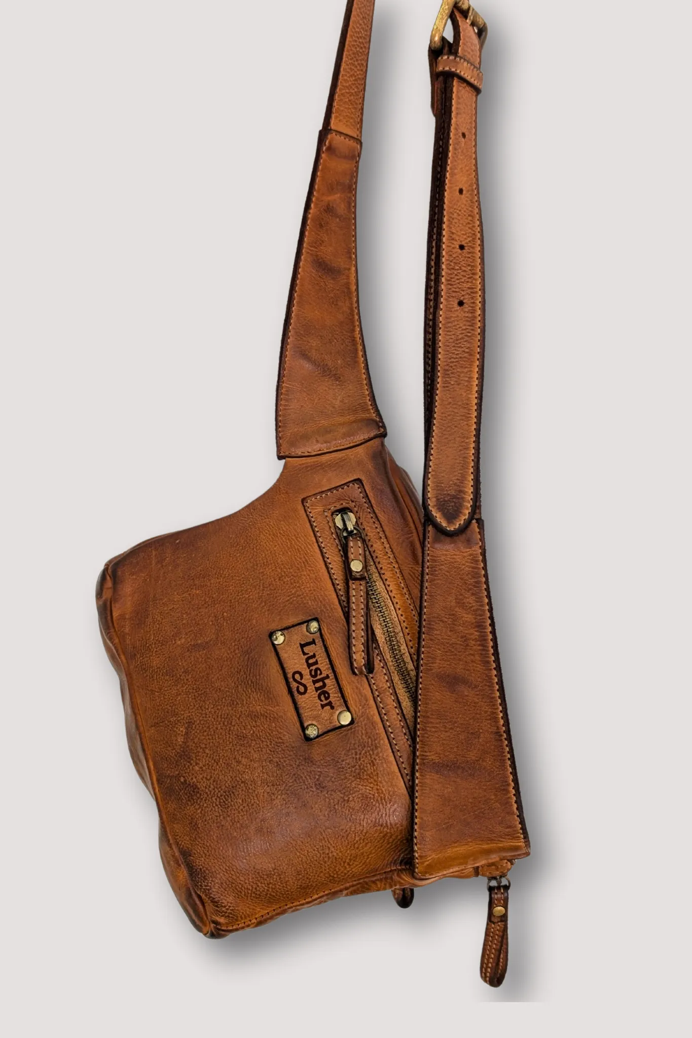 Rider Crossbody Sling Bag - Cognac Rocks