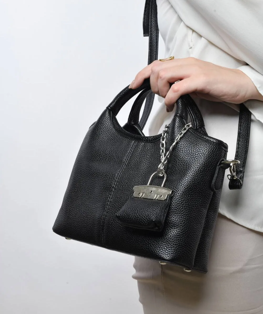 Small black bag with double top handles