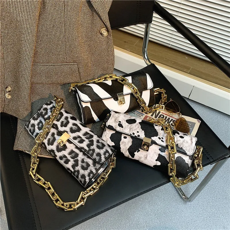 Soft Voluminous Clutch With Square Ring Chain Shoulder