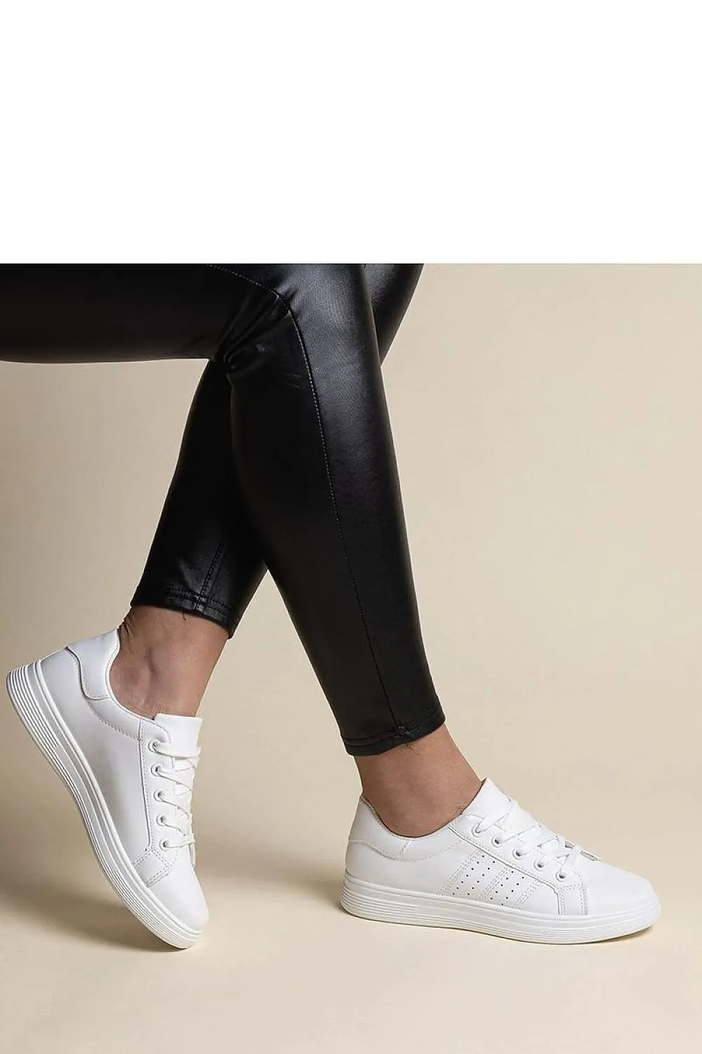 White sneakers with a black element